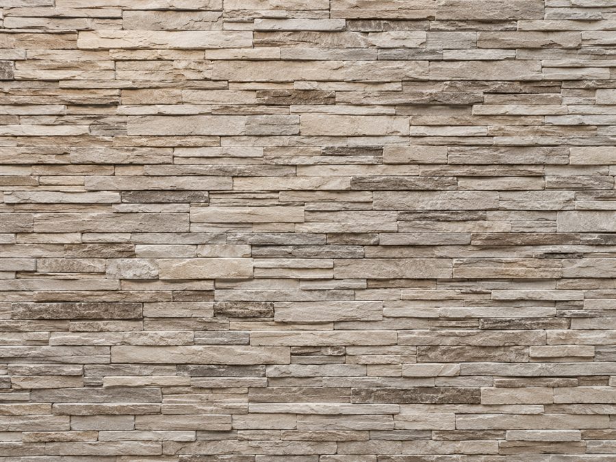 Mur revêtu d’un papier peint imitation pierre